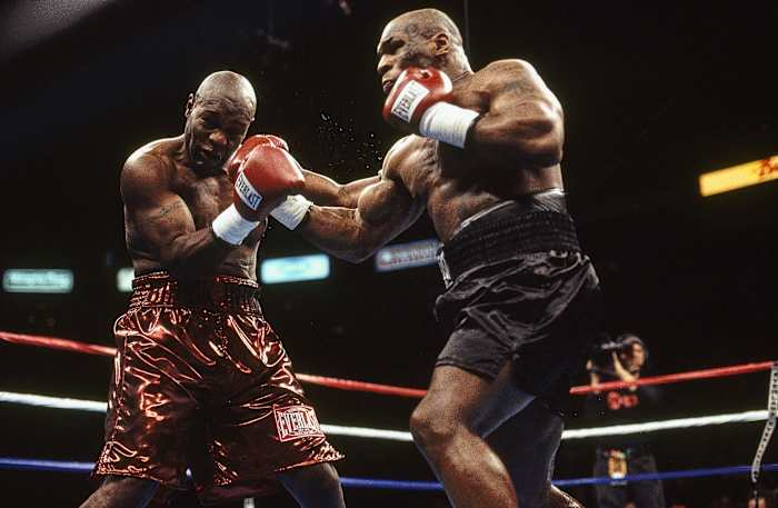 Etienne was still climbing when he met a freshly tattooed Tyson in February 2003.